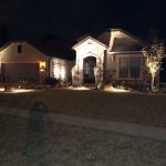 Home exterior at night.